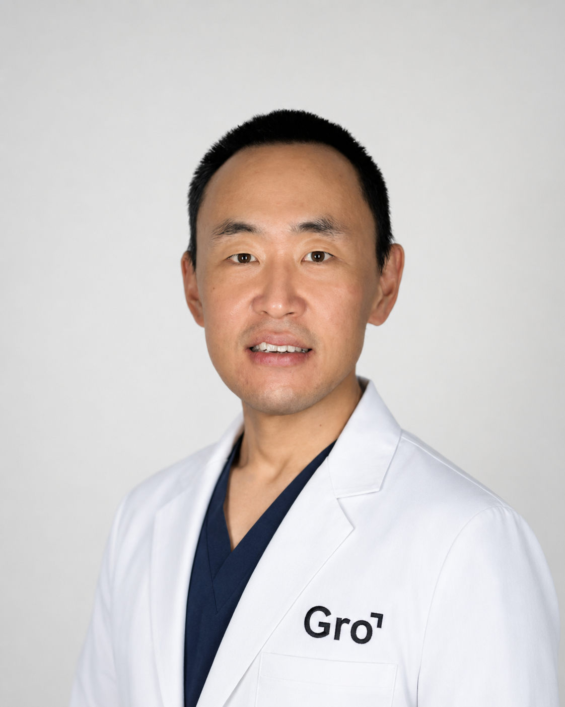 Dr Adam Cho performing a hair transplant at Gro Clinics